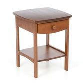 A compact wooden end table with a drawer, ideal for adding storage and style to any living space.